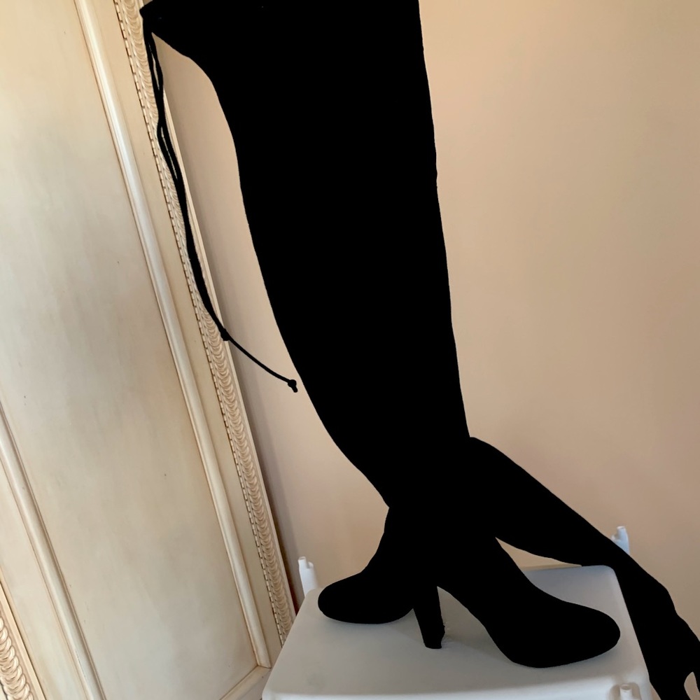 Black thigh high boots